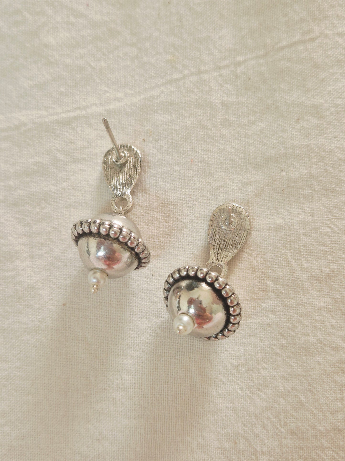 Gola with stud earrings