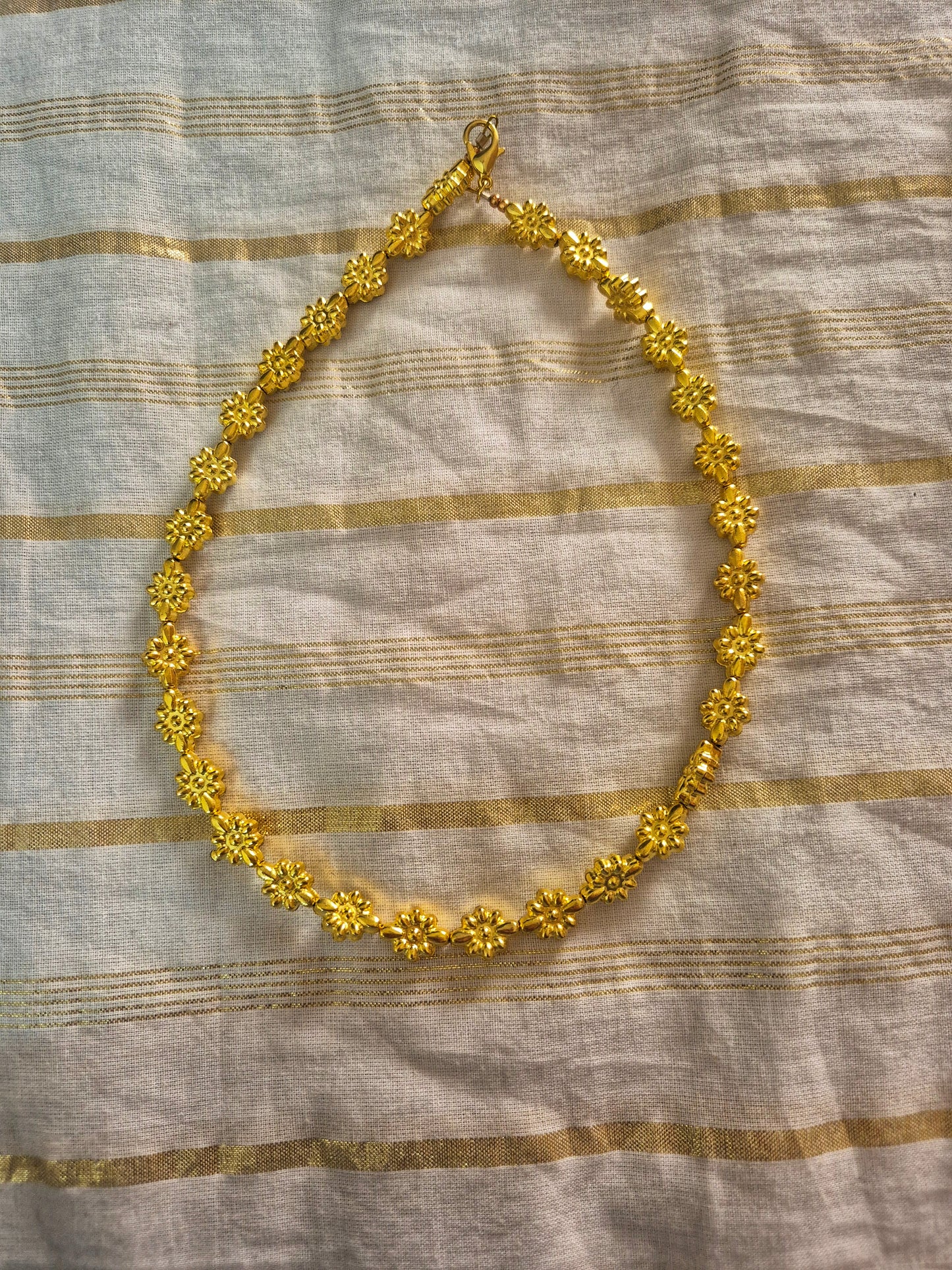 Golden bead choker