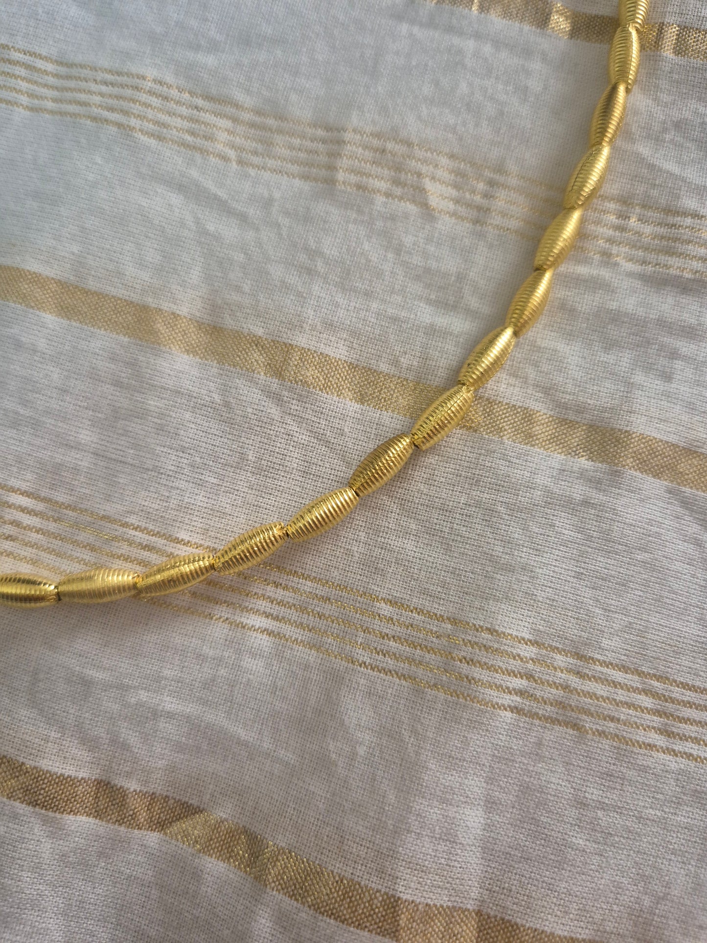 Golden bead choker