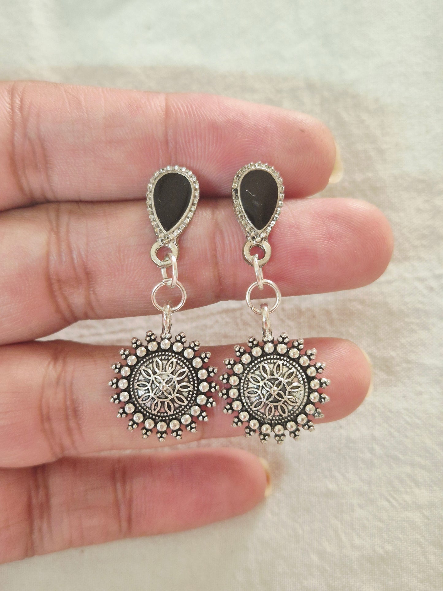 Stud with charm earrings