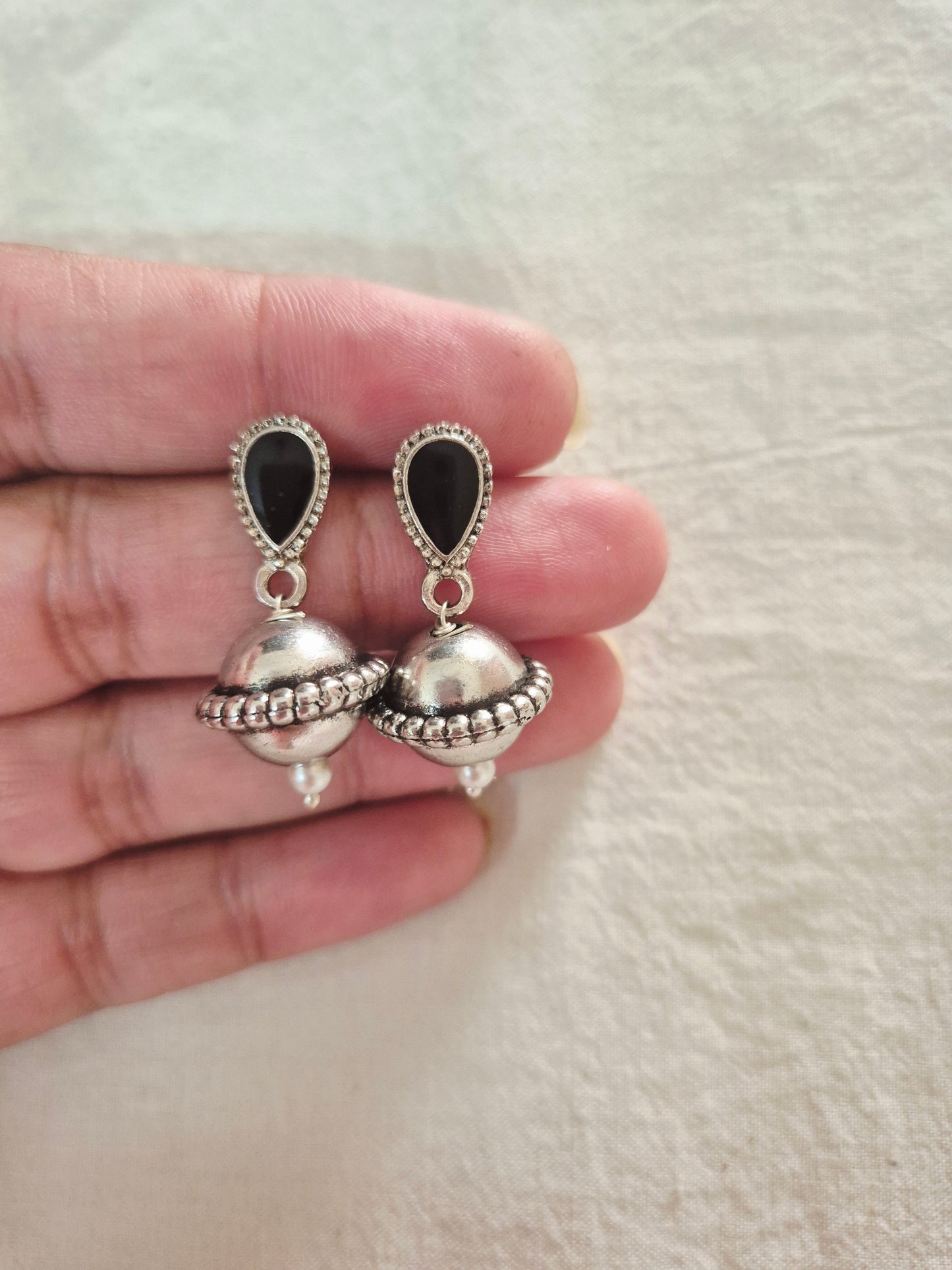 Gola with stud earrings