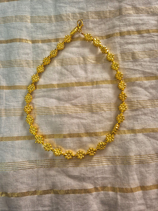 Golden bead choker
